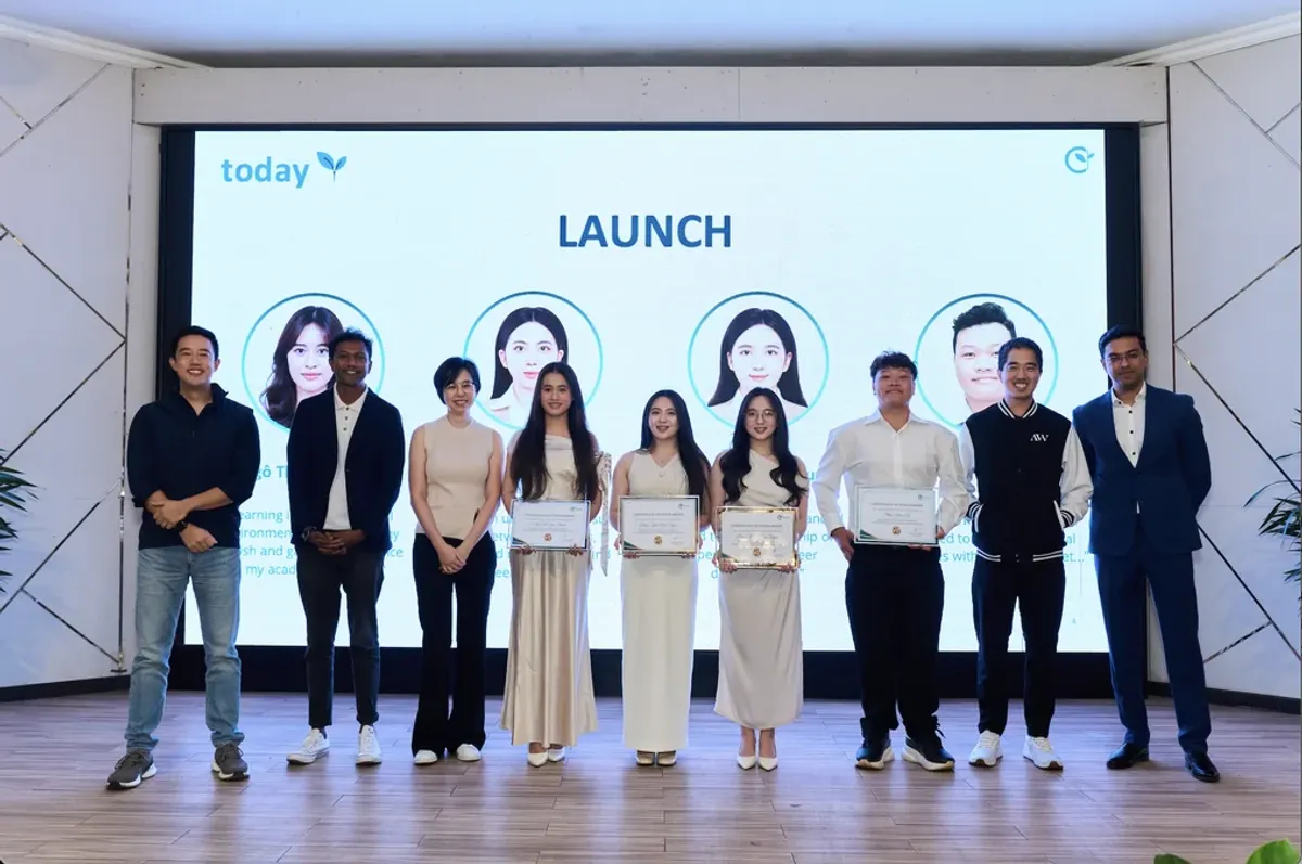 Students and professionals at an education and leadership event