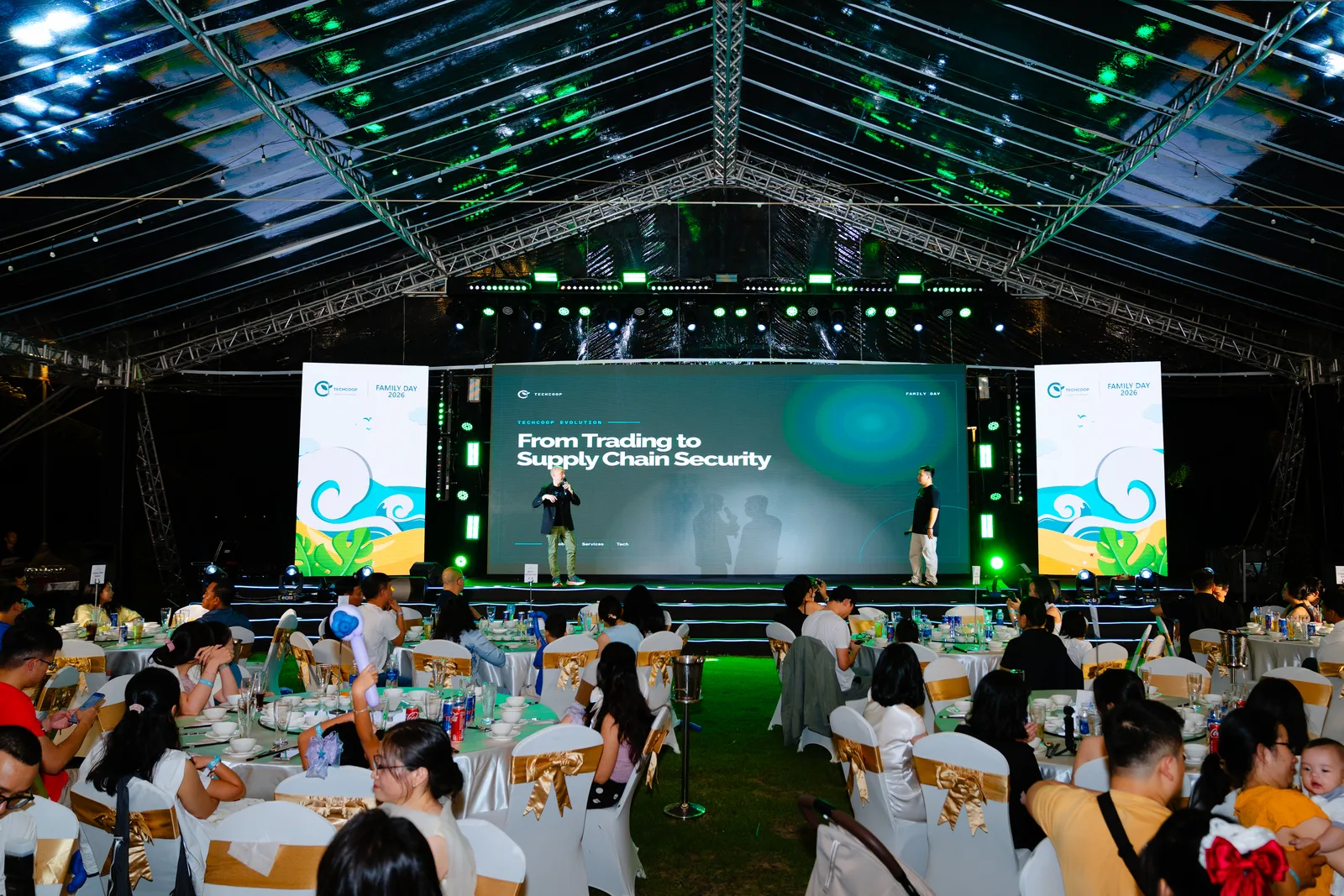 TechCoop colleagues presenting at a company event